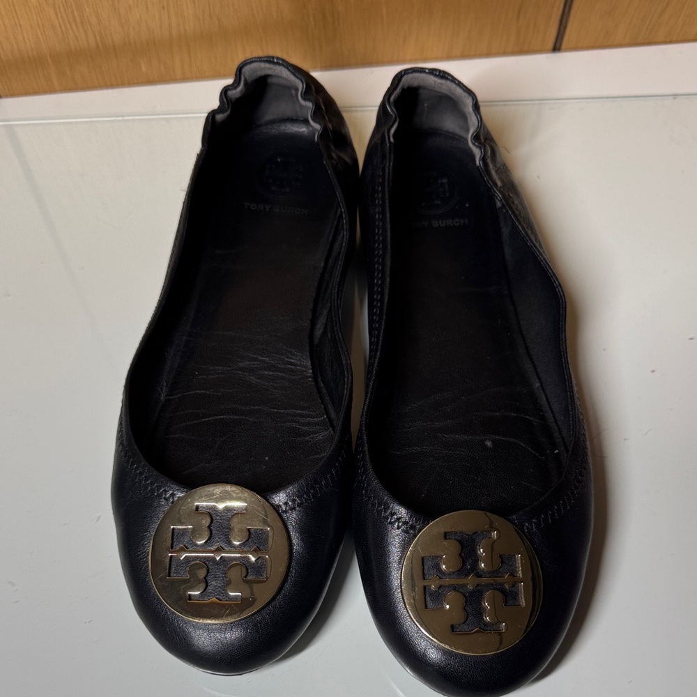 Tory Burch Black Flats with Gold Emblem